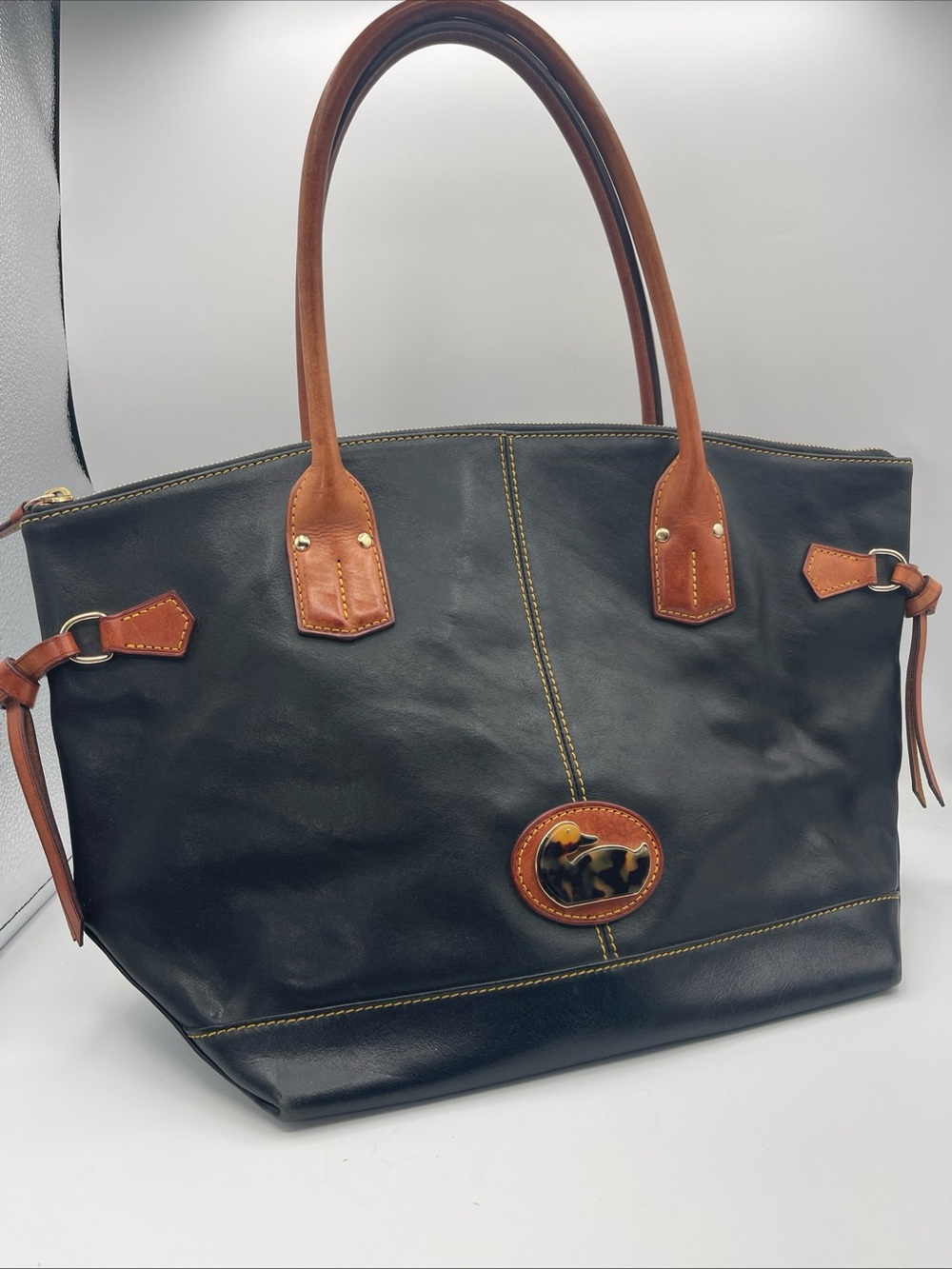 Dooney & Bourke Black Leather Tote with Brown Trim